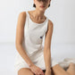 Vestito sportivo minimal con spalline e shorts integrati