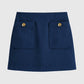Gonna mini blu navy con bottoni in metallo e tasche applicate