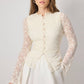 Camicetta romantica in pizzo con bottoni e maniche in organza