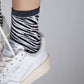 Calze zebra glitterate in cotone pettinato bianco e nero