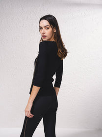 Cardigan in maglia a coste con catene dorate