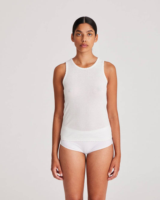 Top in cotone biologico con dettagli in pizzo