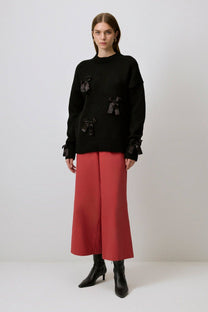 Maglione in maglia con fiocchi