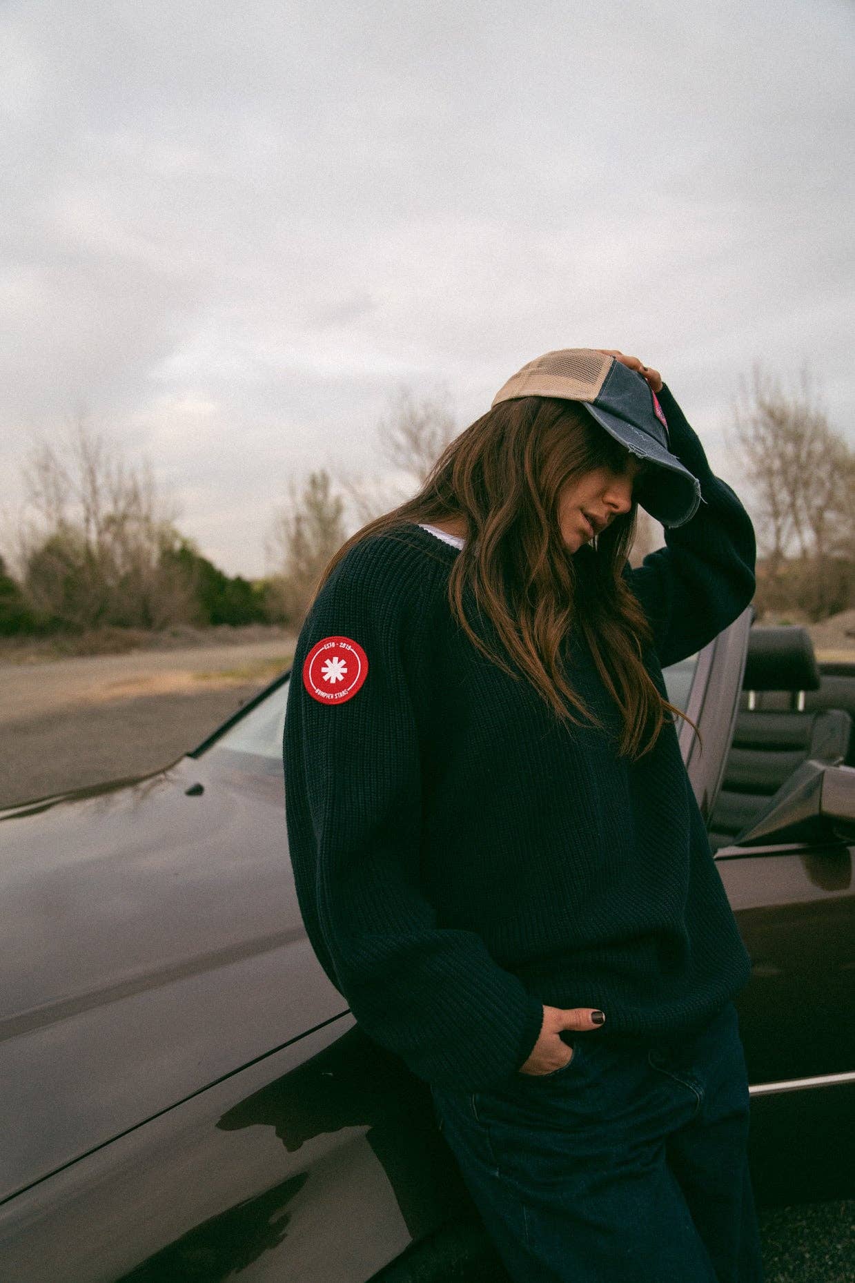 Maglione in cotone biologico con toppa a stella