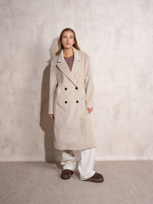 Cappotto lungo doppiopetto con revers