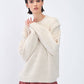 Maglione in maglia con trecce e spalle strutturate