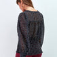 Blusa a pois con scollo a V e maniche morbide