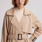 Trench oversize beige con cintura e fibbie