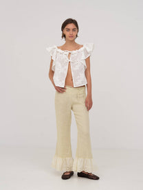 Top bianco Lux con volant e ricami