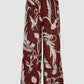 Pantaloni a palazzo bordeaux con stampa floreale