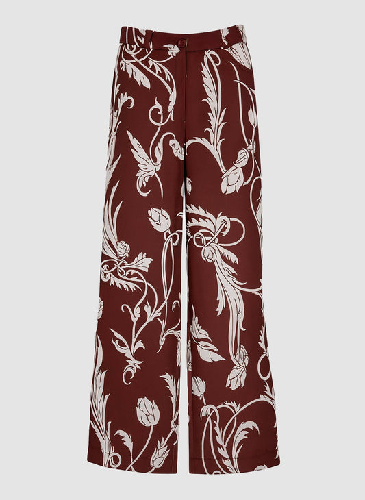 Pantaloni a palazzo bordeaux con stampa floreale