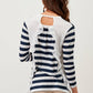 Maglia a righe con volant e cut-out sul retro