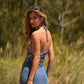 Top halter floreale blu con schiena scoperta