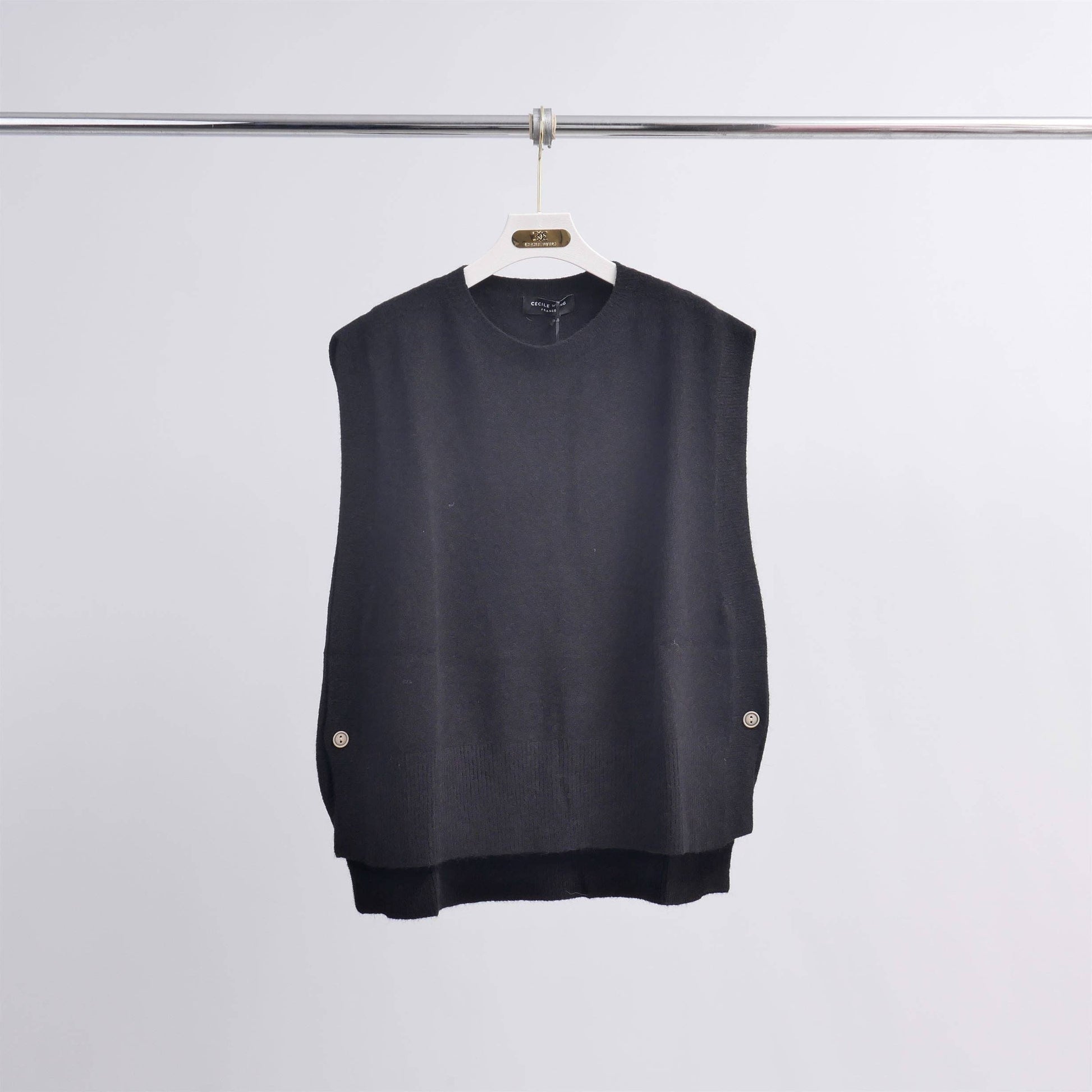 Poncho senza maniche in maglia strutturata con girocollo