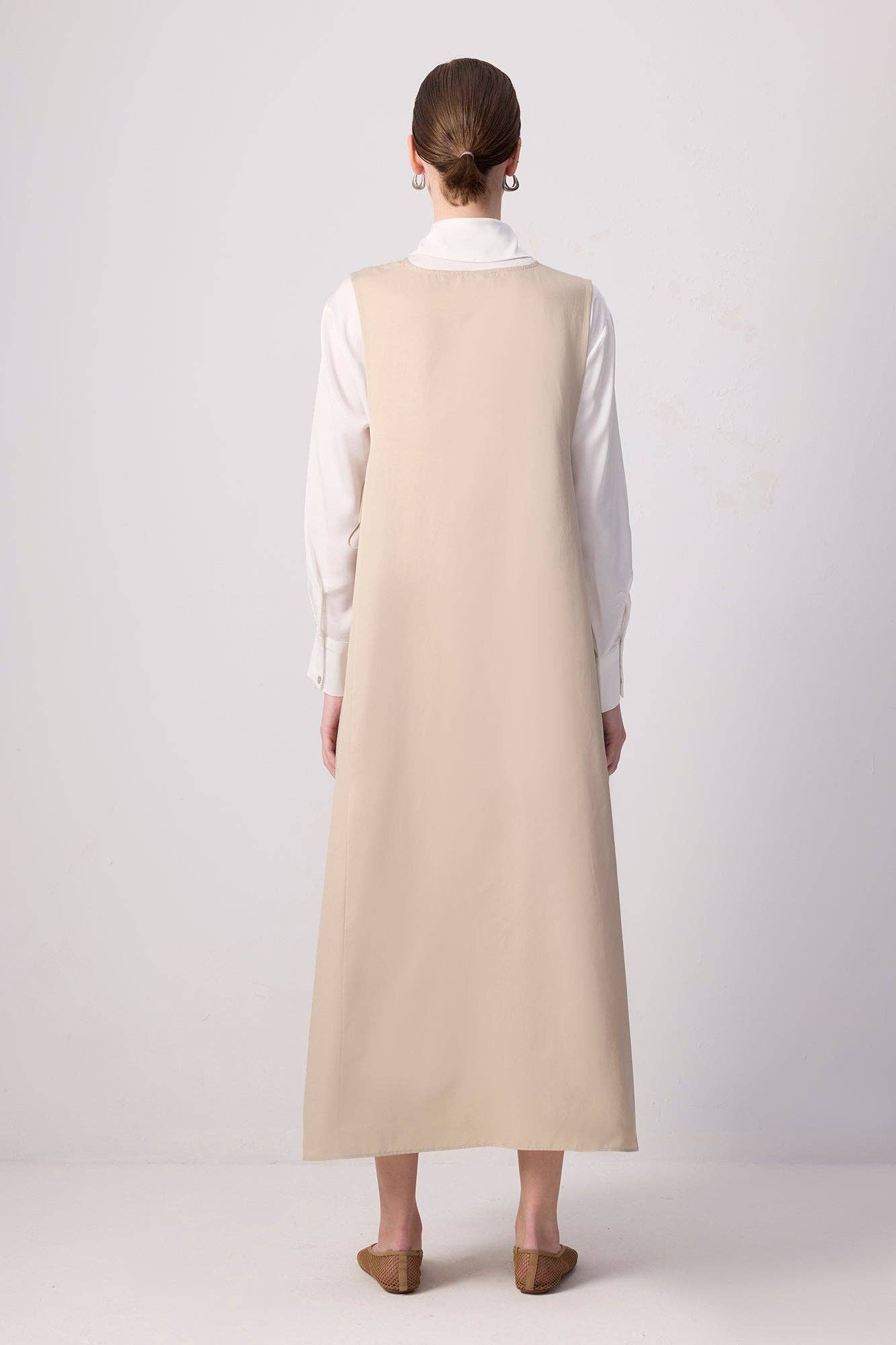 Abito maxi oversize a trapezio con coulisse laterali