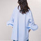 Blusa a righe con volant rinforzati