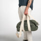 Borsa Aviator verde in cotone con patch e tracolla regolabile
