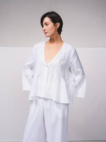 Blusa ampia in lino con scollo a V