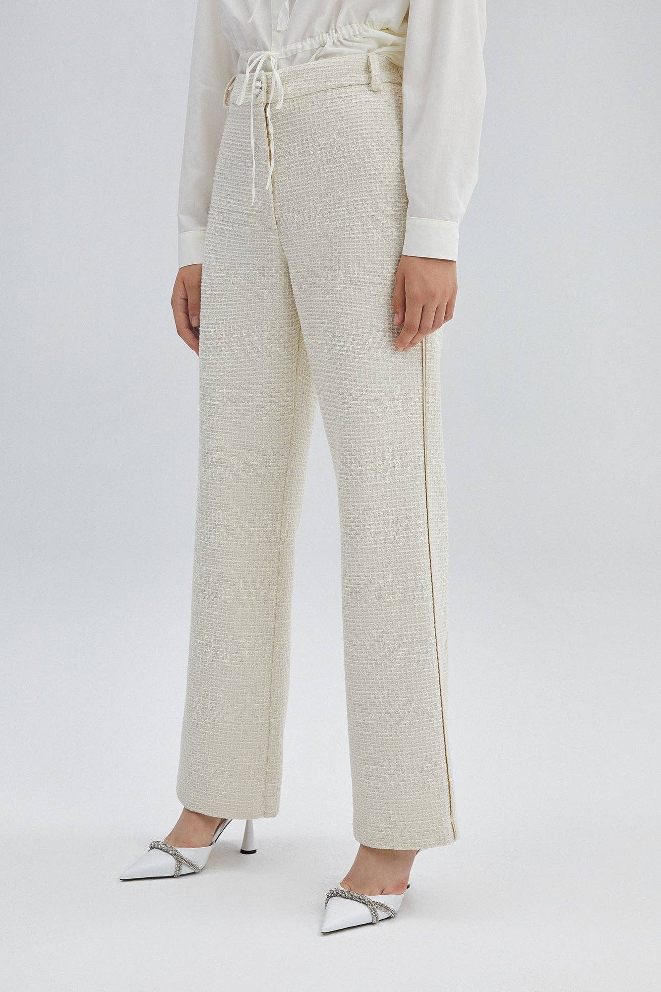 Pantaloni in tweed a vita alta color crema