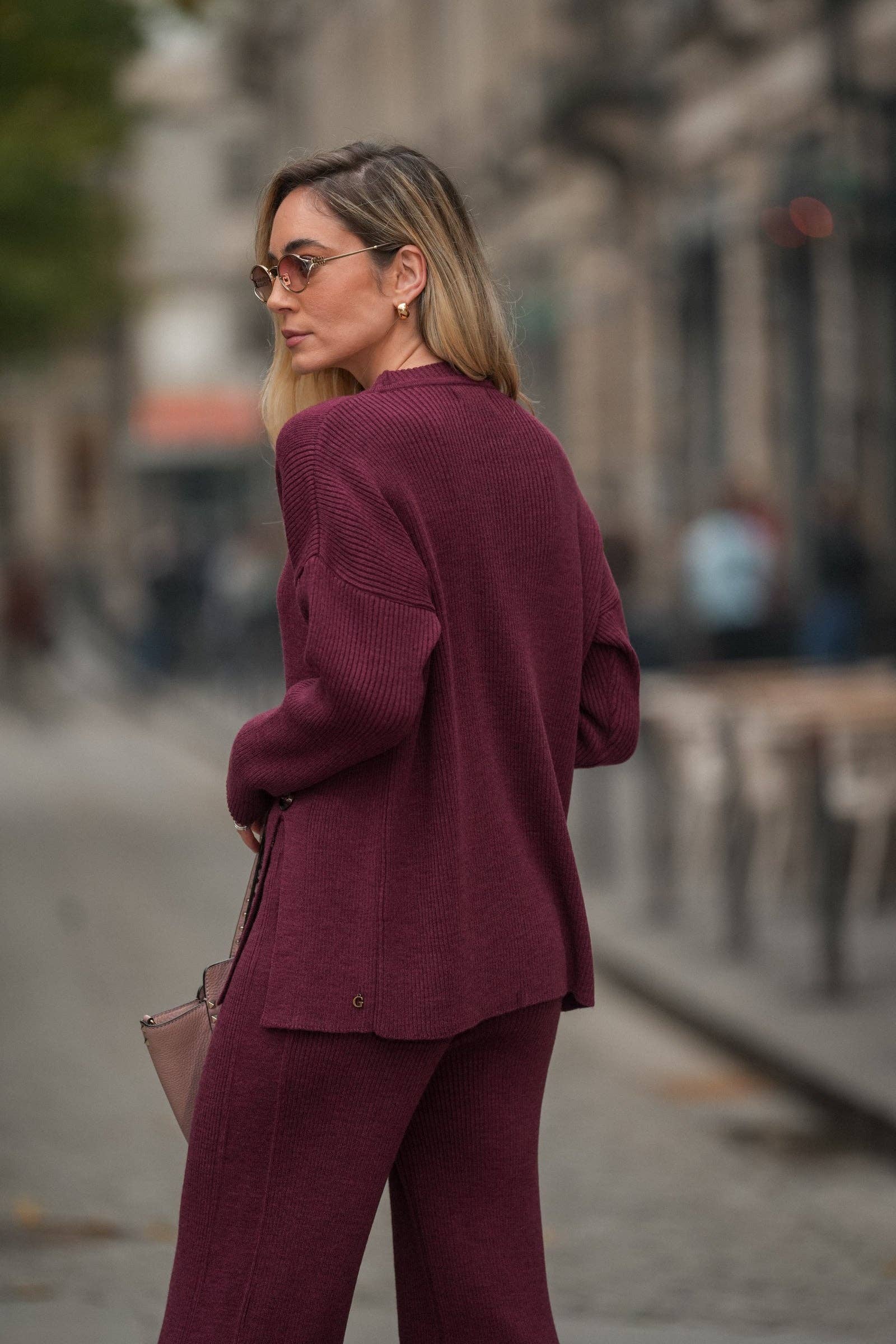 Maglia in maglia con bottoni laterali