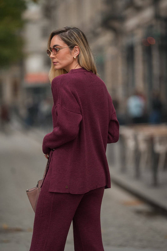 Maglia in maglia con bottoni laterali