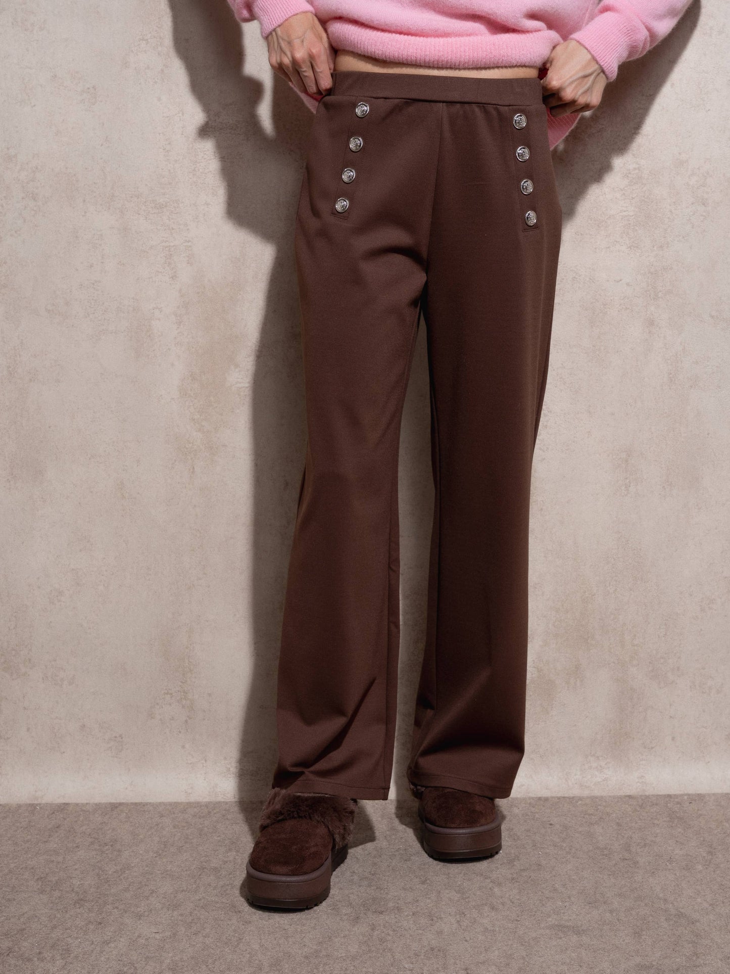 Pantaloni a palazzo a vita alta con bottoni decorativi