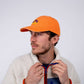 Cappellino arancione in cotone effetto lavato