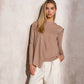 Maglione in maglia con sciarpa abbinata