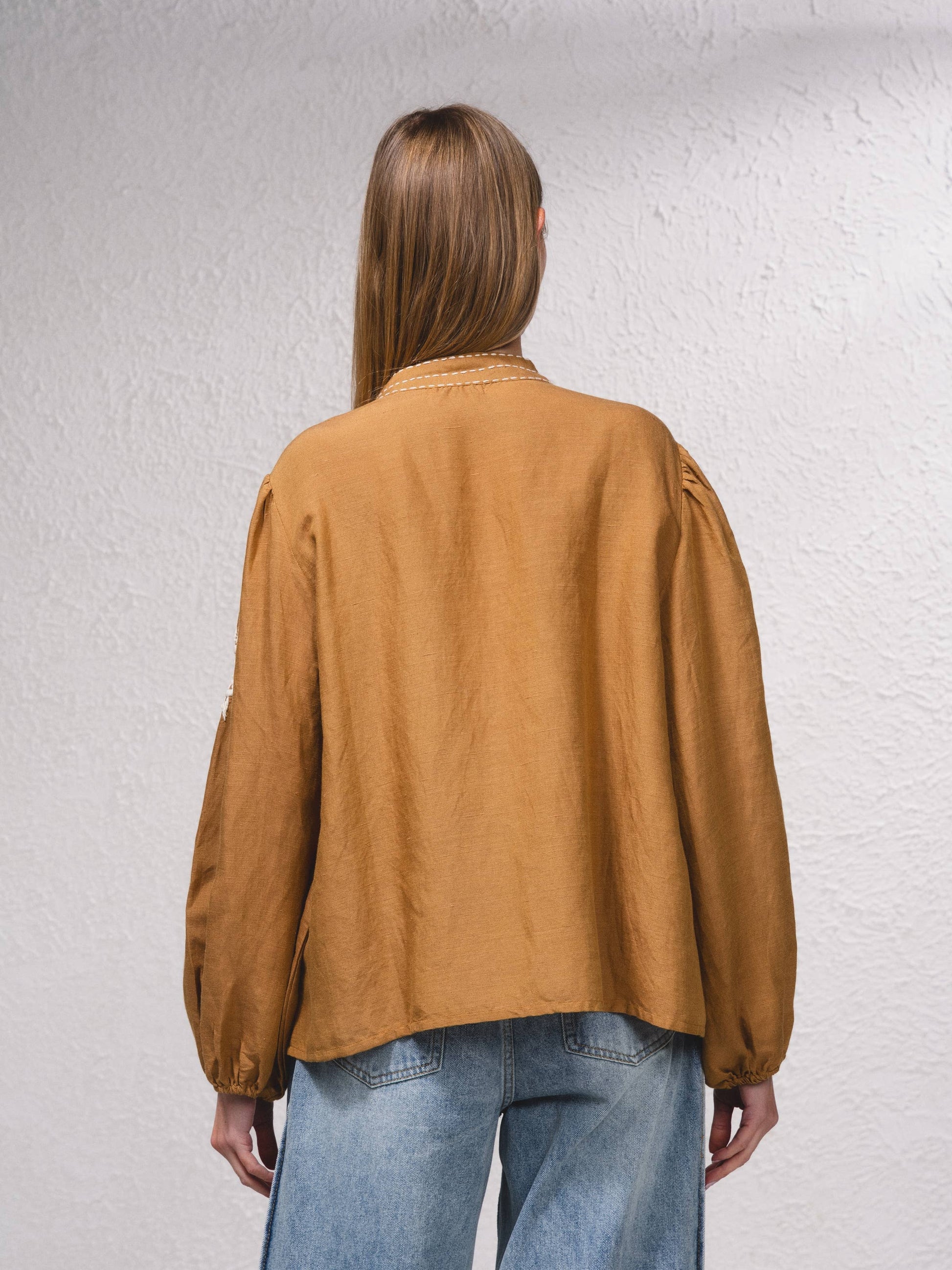 Blusa fluida ricamata in cotone