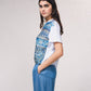 T-shirt oversize corta con stampa e fiocco laterale