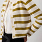 Cardigan in maglia a righe con bottoni dorati