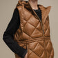 Gilet imbottito lungo con cappuccio da donna