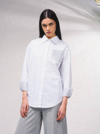 Camicia bianca in cotone con tasca glitter e perline