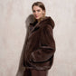 Cappotto corto in eco pelliccia con cappuccio