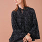 Blusa con balze stampata in viscosa