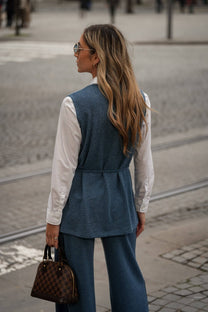 Tunica in maglia con cintura e scollo a V