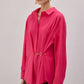 Camicia in popeline fucsia con accessori in metallo