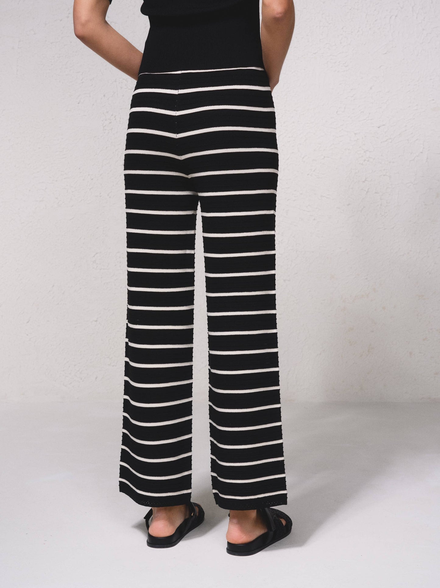 Pantaloni larghi in maglia a righe