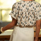 Blusa con stampa geometrica
