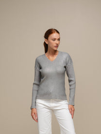Maglione donna laminato a costine con scollo a V