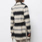Cappotto bouclé intrecciato a righe con cintura