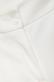 Pantaloni aderenti eleganti con tasche laterali