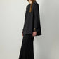 Tunica in crêpe nera con polsini in chiffon trasparente
