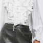 Blusa bianca con volant e laccio al collo