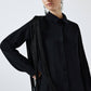 Camicia in crêpe nera con maniche a nappine