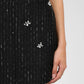Gonna mini in tweed con strass e perle