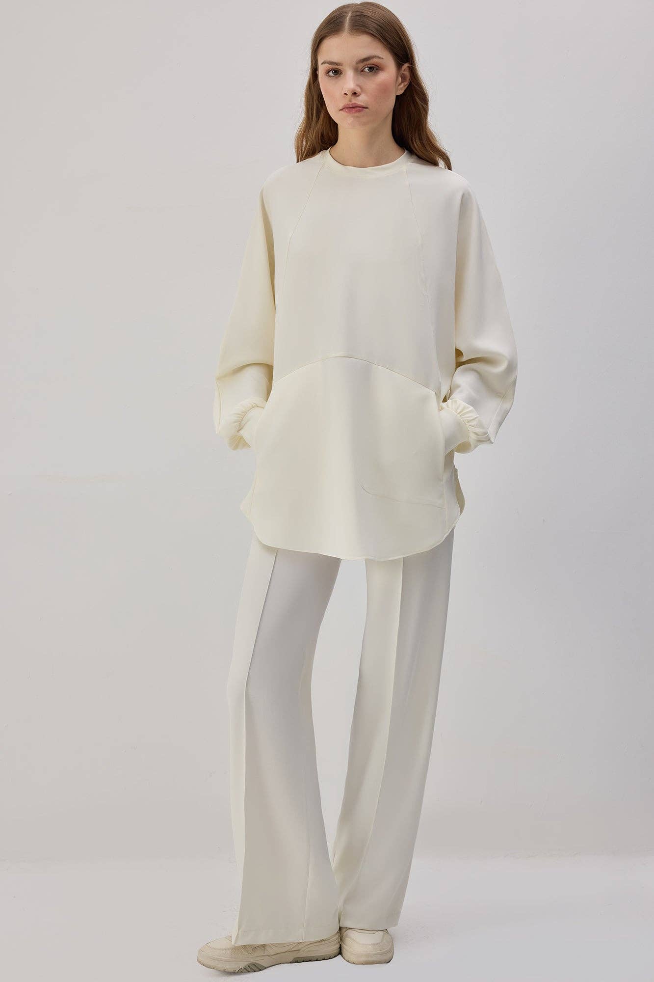 Tunica in crêpe con tasche