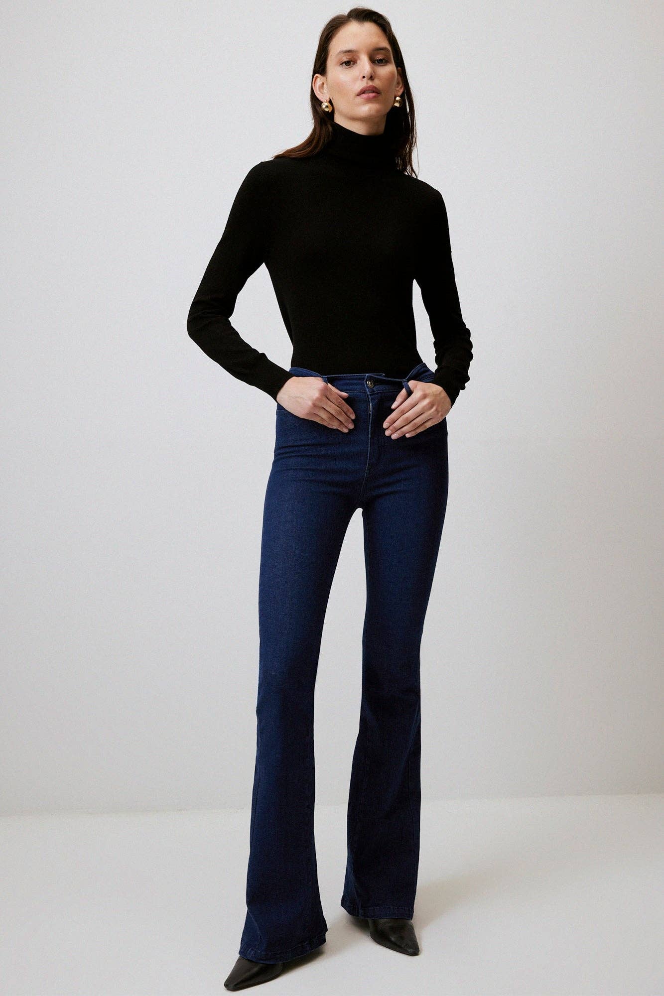 Jeans a zampa vita alta in denim stretch