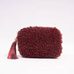 Borsa a tracolla in eco pelliccia con nappa