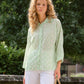 Blusa ricamata con stampa all-over